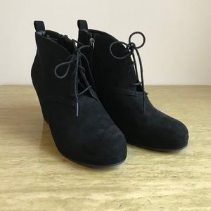 Black ankle booties with a heel